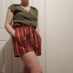 High waisted burnt orange striped shorts.